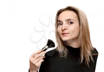 Royalty Free Photo of a Woman Applying Makeup