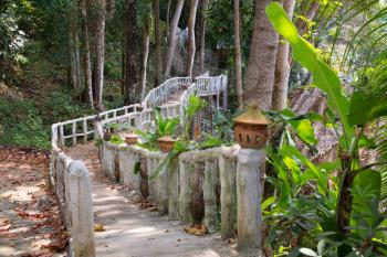 stone pathway with handrails in the jungle Thailand