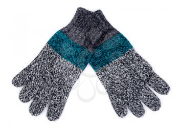 Knittet winter gloves on white background