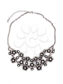 Luxurious necklace of bright metal on a chain. Isolate on white.