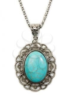 Oval pendant with turquoise stone in a silver frame. Isolate on white.