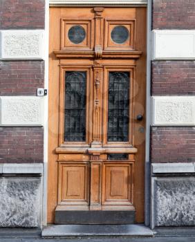 An old wooden door elegant. Gouda, the Netherlands.