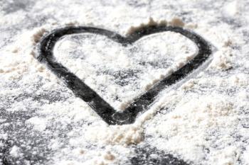 Royalty Free Photo of a Heart in Flour
