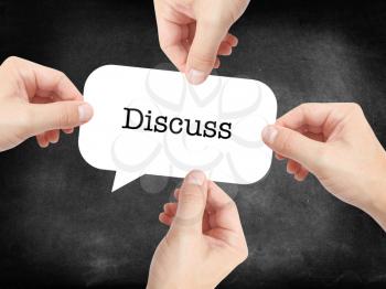 Discuss written on a speechbubble