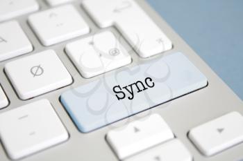 Sync written on a keyboard