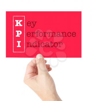 Key Performance Indicator explained on a card held by a hand