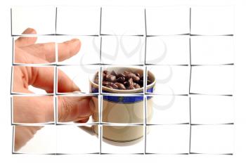 cup of coffee beans on white background