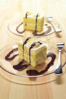 fresh cream cake closeup with chocolate sauce topping 