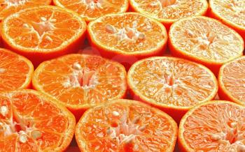 ripe orange mandarine cutted in half 