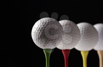 Royalty Free Photo of Golf Balls on Tees