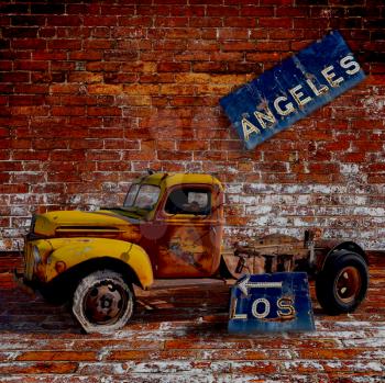Royalty Free Photo of a Los Angeles Freeway Sign And Old Truck