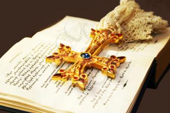 Royalty Free Photo of a Cross on a Bible