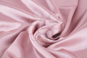 Pink silk fabric for background.