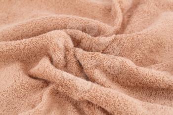 Brown towel texture as a background.