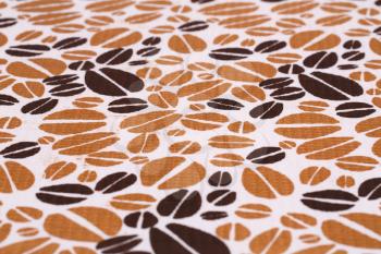 Tablecloth with coffee pattern  closeup picture.