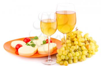 Wine, grapes, cheese and tomatoes isolated on white background.