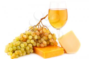 Two pieces of cheese, grapes and glass of wine isolated on white background.