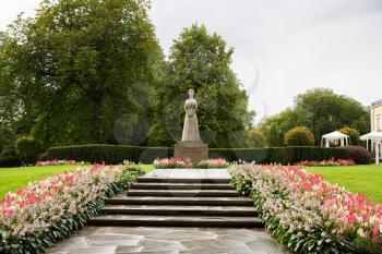 The statue of Queen Maud in The Royal Palace park in Oslo, Norway.