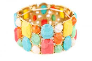 Stylish bracelet with colorful stones isolated on white background.