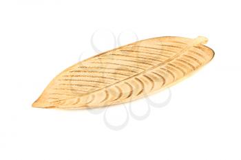 Wooden tray in leaf shape isolated on white background.