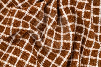 Brown and white towel texture as a background.