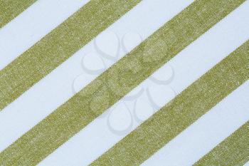 Green and white kitchen towel texture as a background, horizontal image.