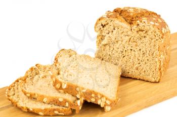 Wholegrain bread bun with oat on wooden board on white background.
