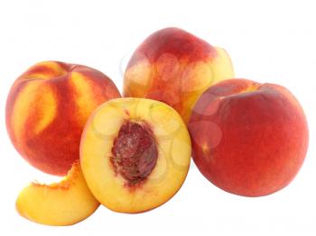 A few peaches with slice of one, on white background. Isolated