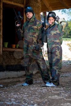 Paintball players posing to the camera