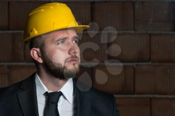 Portrait Of Young Construction Manager With Arms Crossed