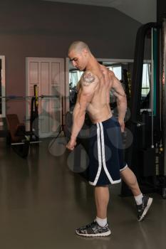 Portrait Of A Young Physically Fit Man Showing His Well Trained Body - Muscular Athletic Bodybuilder Fitness Model Posing After Exercises