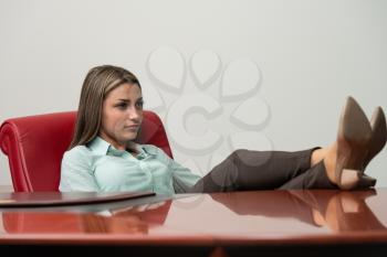 Business Woman Relaxing While Sitting On An Office Chair - Successful Businesswoman At Work