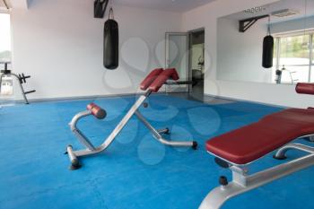 Equipment And Machines At The Modern Gym Room Fitness Center