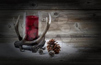 Western style Holiday decorations on weathered barn wood with Vignette

