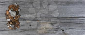 Vintage coins on weathered wooden planks