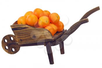 Oranges on pushcart isolated on white background.