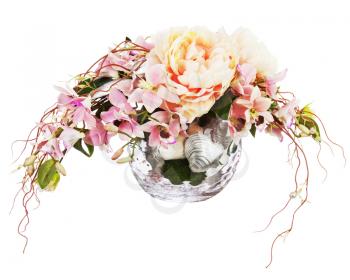Bouquet from peon flowers and orchids in glass vase isolated on white background. Closeup.