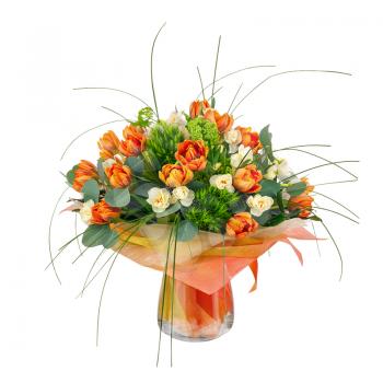 Bouquet of narcissus, tulips and other flowers in glass vase isolated on white background. Closeup.