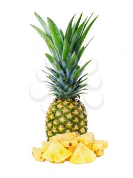 Ripe whole pineapple with slices isolated on white background. Closeup.