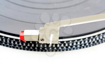 Macro shot of an old turntable record player needle