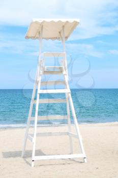 Lonely lifeguard tower on an empty beach
