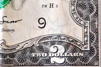 Macro shot of the corner of a rare two dollar bill 