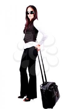 Young business woman walking pulling a laptop bag