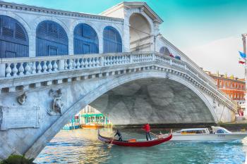 Rialto Bridge is one of the four bridges spanning the Grand Canal