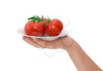 plate with tomatoes isolated on white