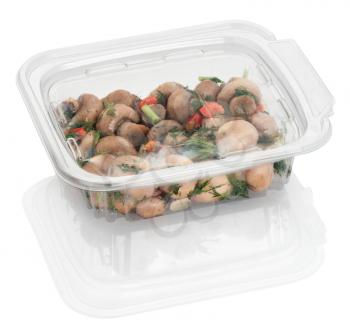 mushroom salad in a disposable plastic container isolated on white with clipping paths