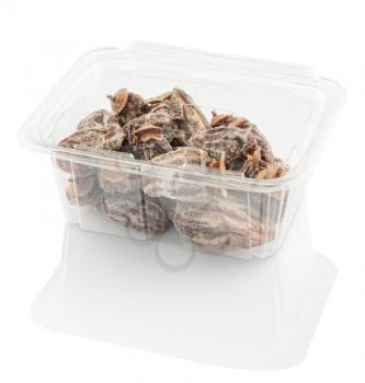 dried persimmon in a plastic food container, isolated on a white background with clipping path