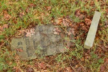 A broken gravestone on an old jewish graveyard