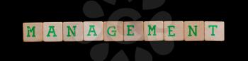 Green letters on old wooden blocks (management)
