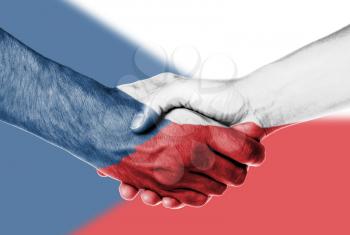 Man and woman shaking hands, wrapped in flag pattern, The Czech Republic